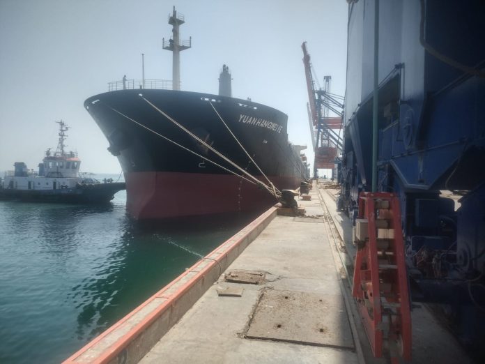 A cargo Ship is berthed at Gwadar Port